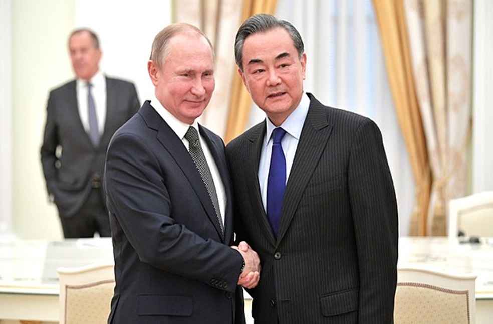 Vladimir Putin with Wang Yi