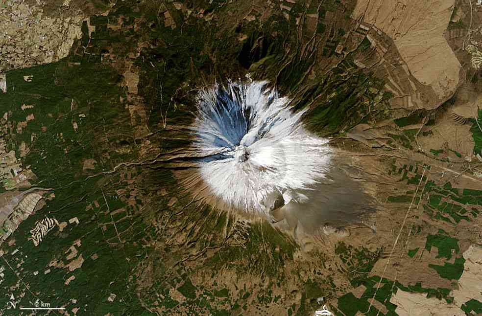 Mount Fuji ‘snowless’ for record time after Japan's hot summer_Image Via_NASA