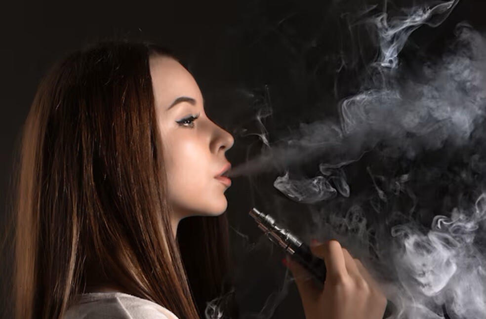 face-vaping-young-woman-black