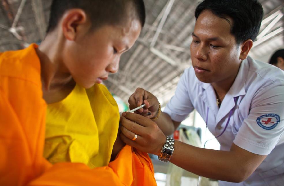 Clinic scene highlighting challenges in childhood vaccine coverage