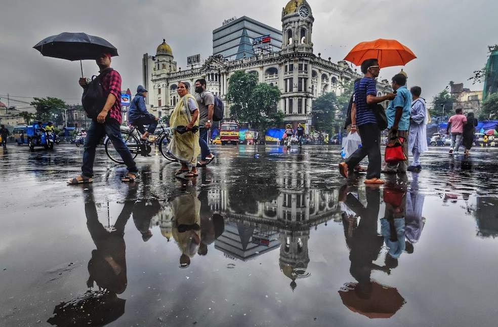 People Walking in the Rain