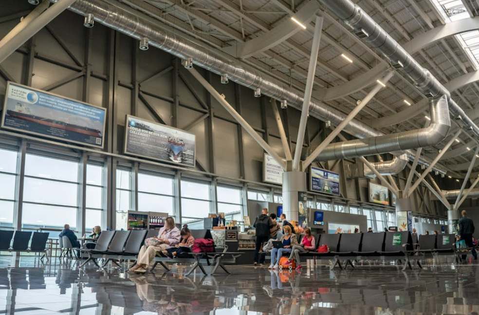 Travellers sitting at terminal due to US government-related airport delays