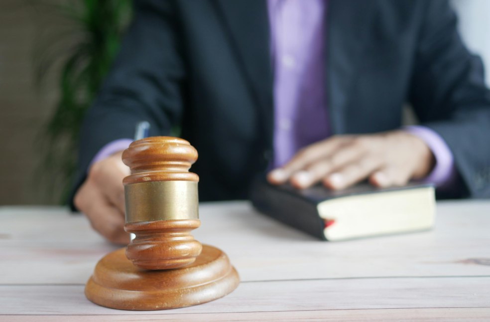 Brown Wooden Gavel on Brown Wooden Table