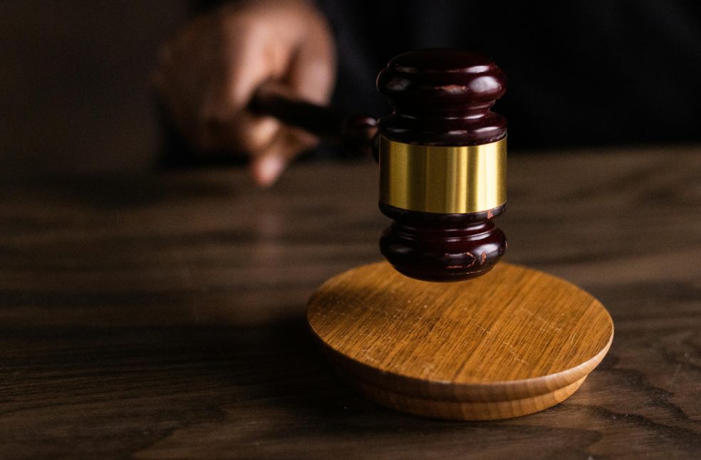 Brown Wooden Gavel on Brown Wooden Table