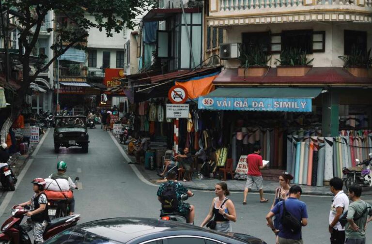 Vietnam foreign arrivals set new record despite pollution risks Bustling Street Scene in Hanoi, Vietnam
