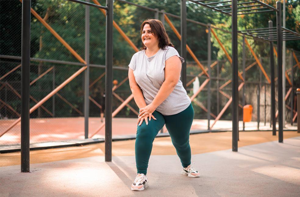 Obese person exercising as part of a routine alongside weight loss jabs