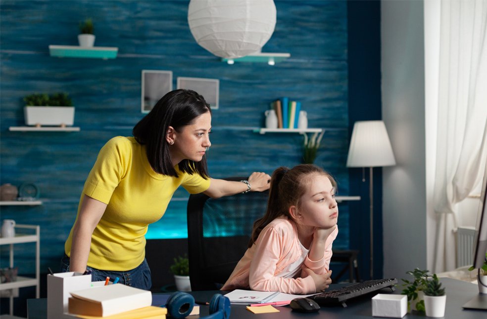 Mother helping her child