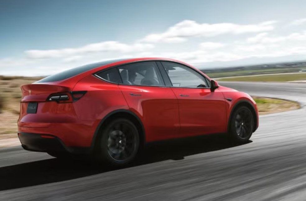 Tesla electric car with hidden door handles affected by China safety rules