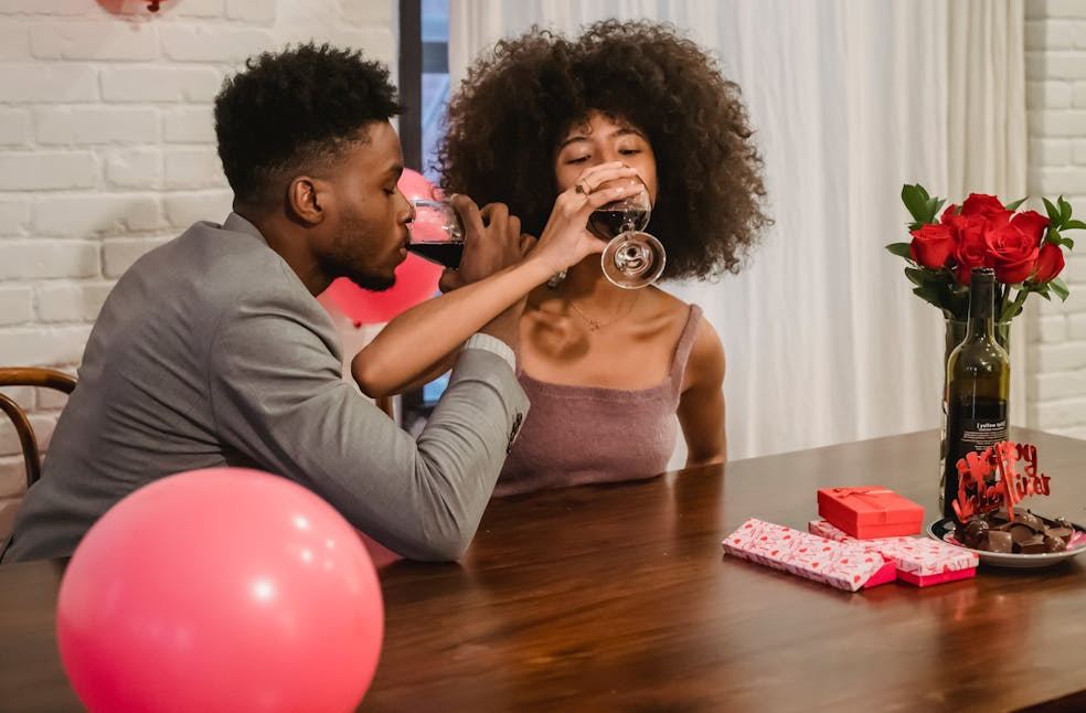 couple drinking wine at table