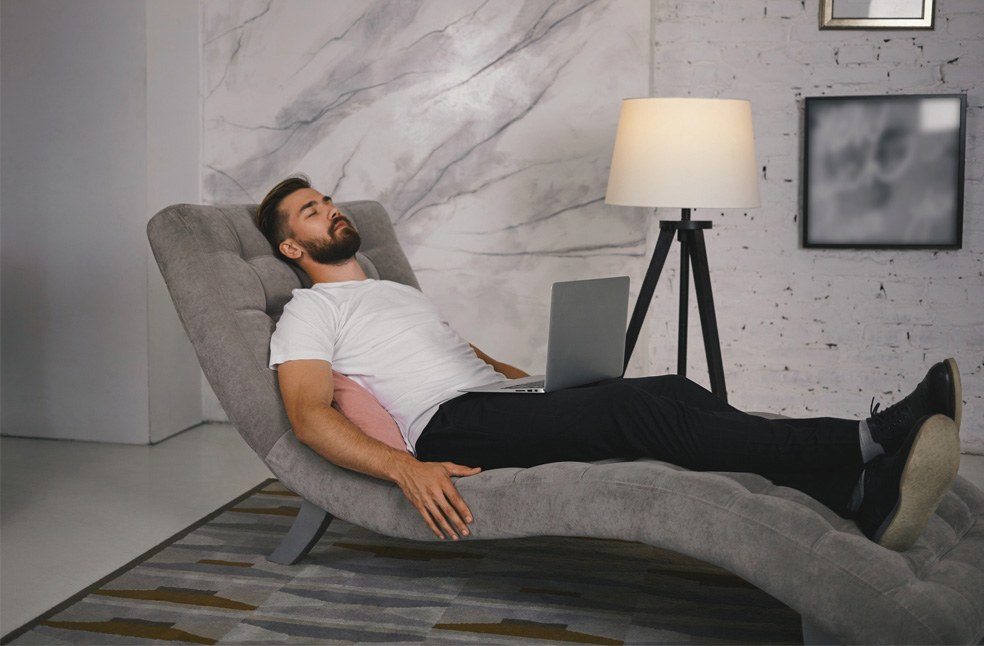 A man sleeping on the couch