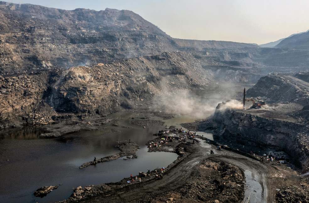 A dramatic aerial view of a coal mine
