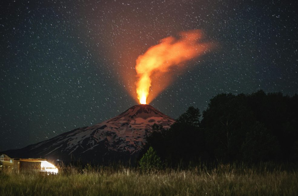 dramatic night view of Volcano erupting