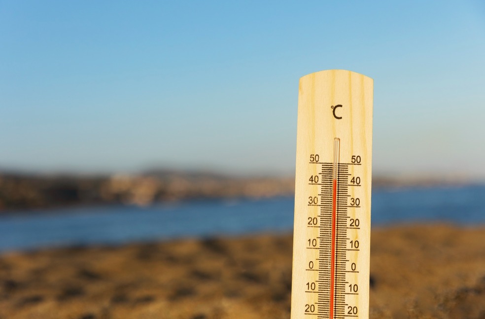 Close up on thermometer showing high temperature