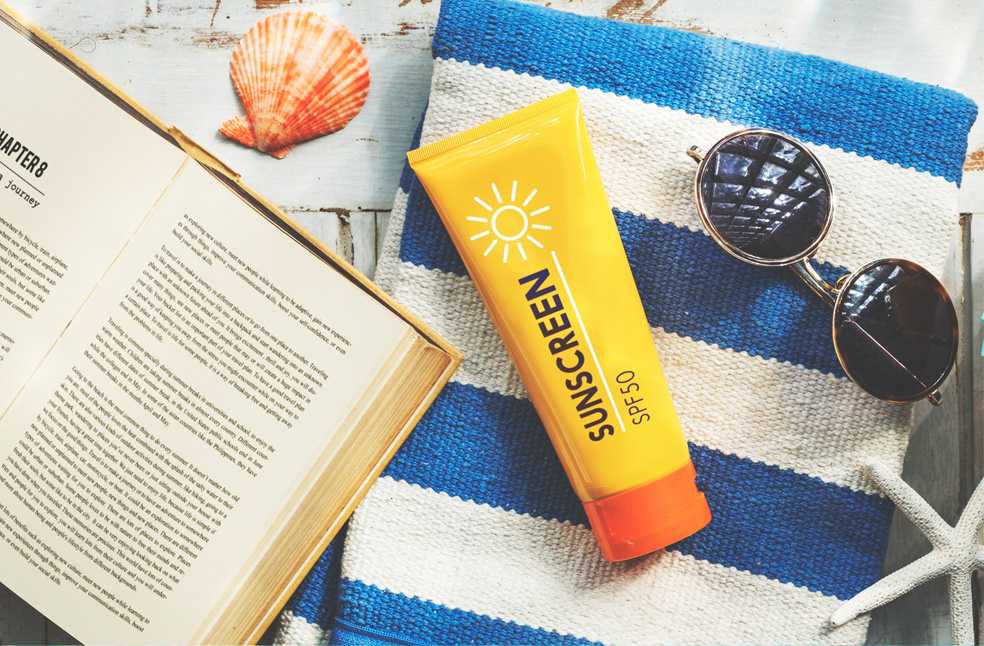 Sunscreen on a beach towel
