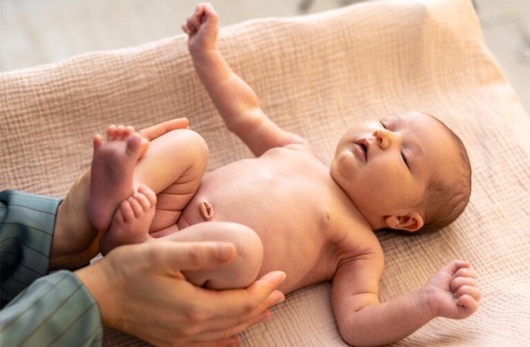 England announces nationwide newborn screening for SMA A newborn baby lying on a dressing table