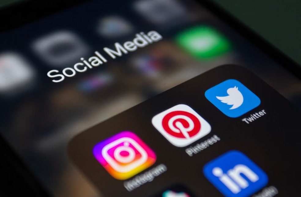 A smartphone screen displaying popular social media applications l
