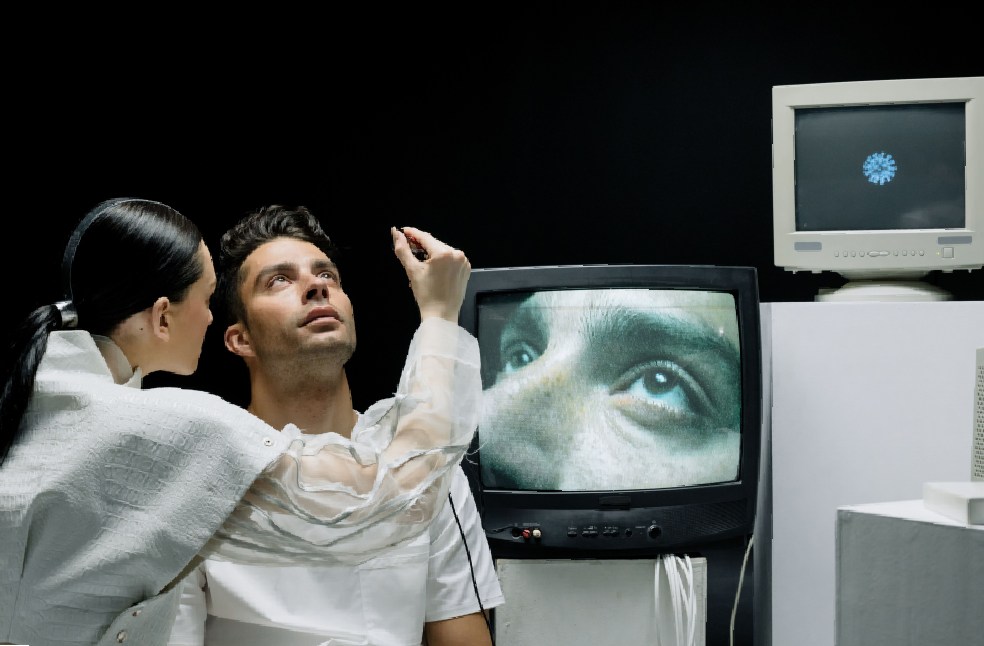 A modern eye examination with advanced technology featuring screens and professional care.