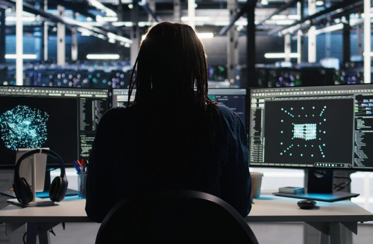 Global tech firms urge action against rising AI threats Data center computer scientist using node tree software to analyze datasets