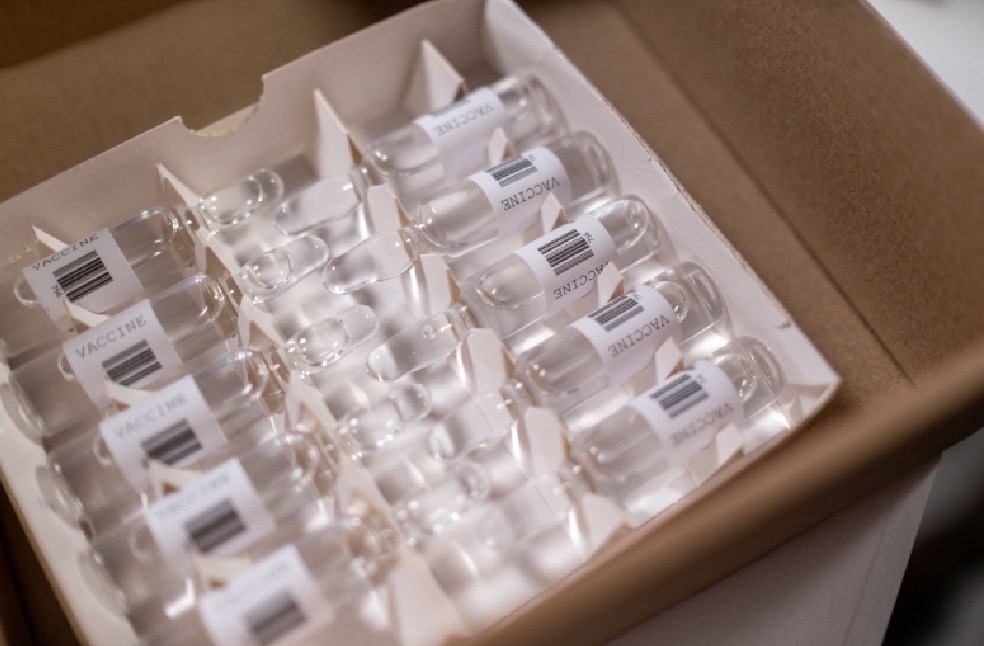 Box of vaccine vials ready for distribution