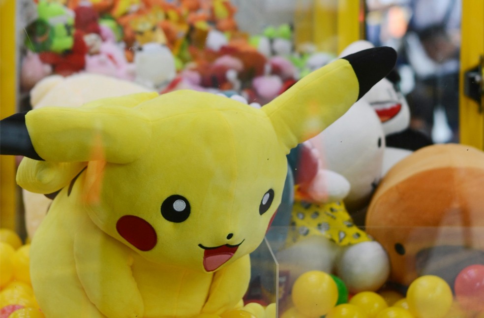 Pokémon toy inside a claw machine