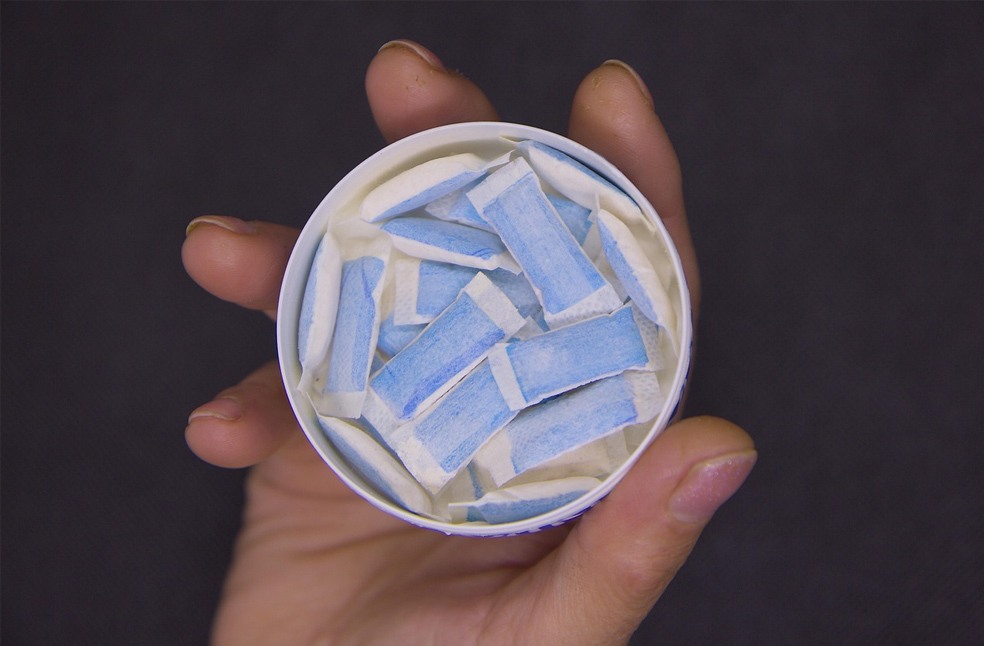Nicotine pouches in hand