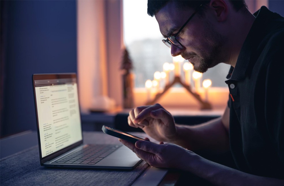 a man checking his emails