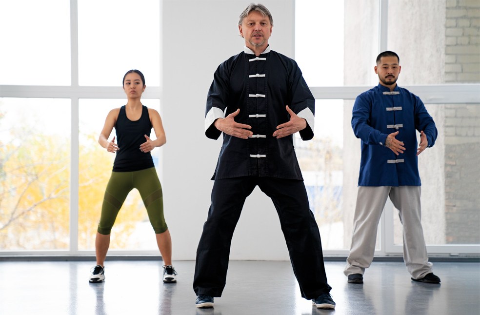 A group of older people practicing Tai Chi