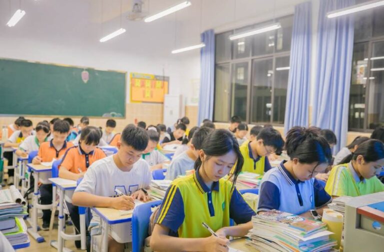 Mexico introduces new cellphone rules for school students A group of students writing in a classroom during a lesson