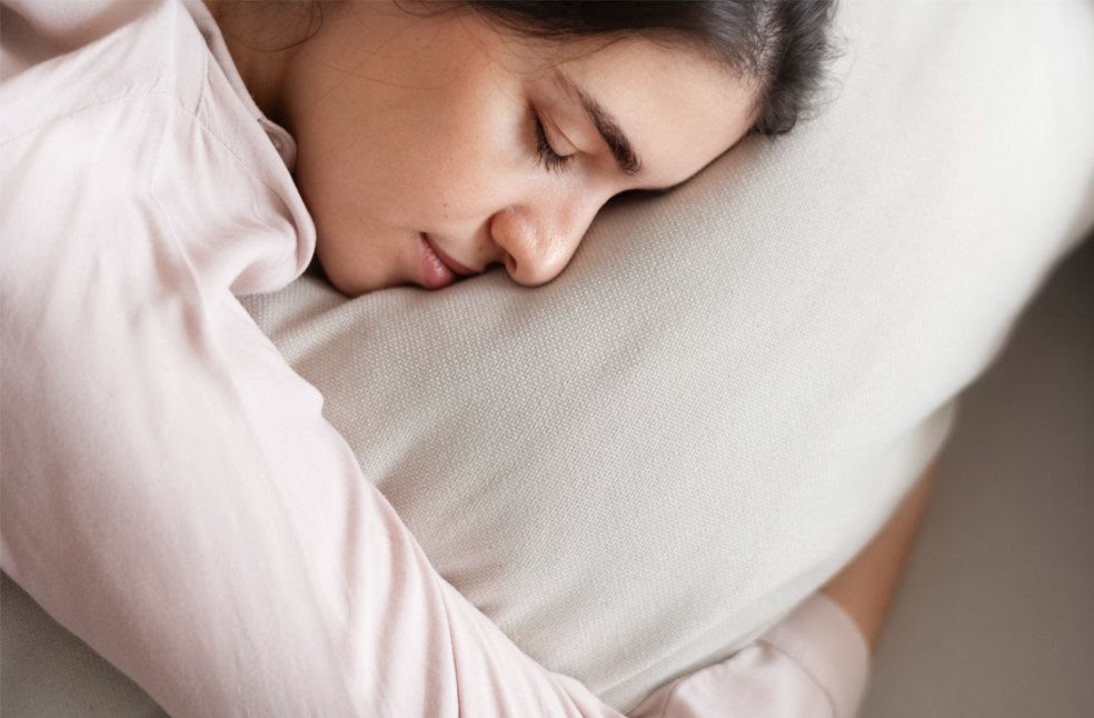 A woman sleeping upside down