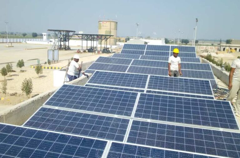 Bangladesh launches rooftop solar incentives as power shortages worsen Workers installing solar panels on a rooftop for renewable energy generation