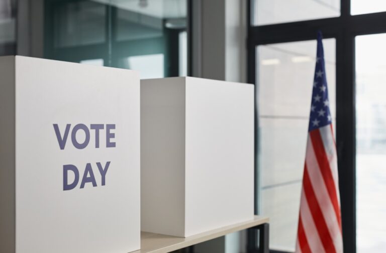 US Supreme Court blocks Trump’s mail-in voting restrictions Voting booth setup with American flag