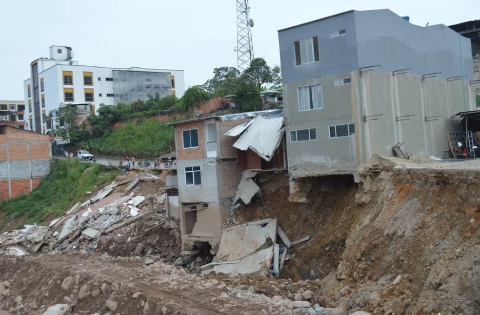 Severely damaged urban buildings after a landslide 