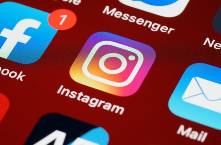 Ofcom investigates Meta over Instagram Instants safety assessment Vibrant close-up of popular social media app icons on a smartphone screen