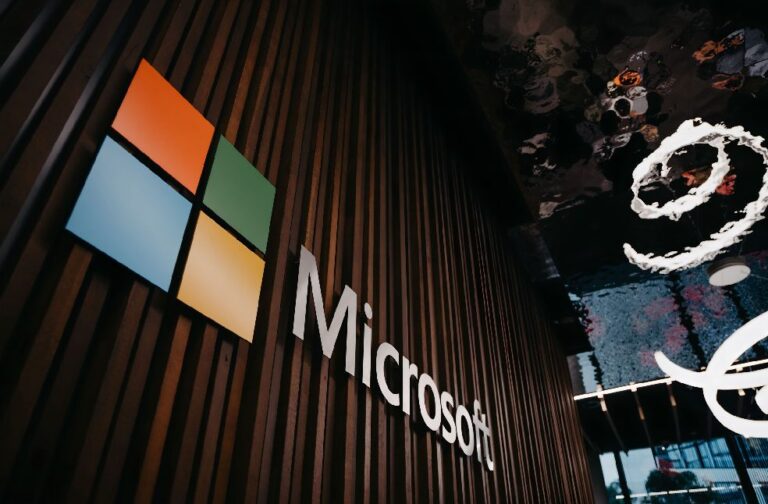 Microsoft develops AI system for step-by-step medical diagnosis Interior view of Microsoft office with logo on wooden wall in Brussels, Belgium.