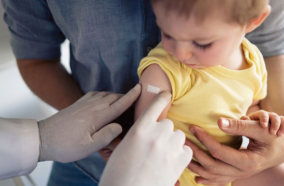 A kid getting measles vaccination